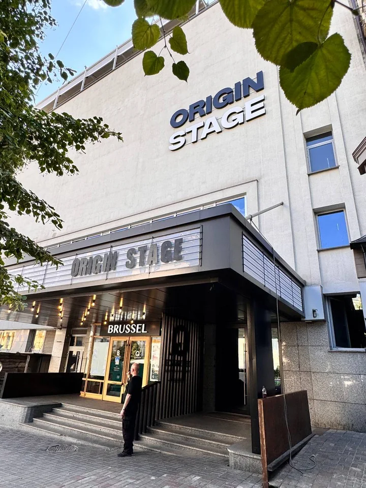 ORIGIN STAGE: Halo-lit facade lettering and installation at height